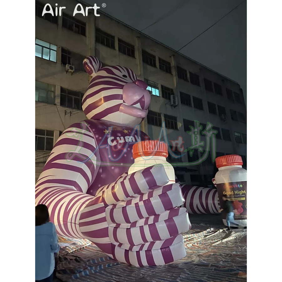 2023 Giant Purple Inflatable Striped Bears Hand Grasping Soft Candy with LED Lights for Event Display or Advertising