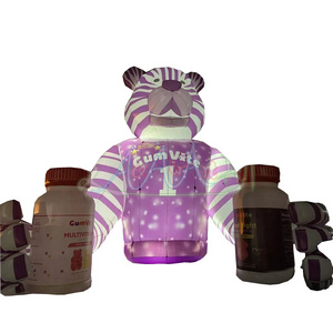 2023 Giant Purple Inflatable Striped Bears Hand Grasping Soft Candy with LED Lights for Event Display or Advertising