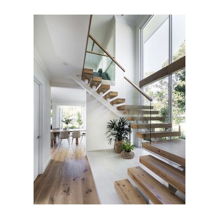 indoor light home stairs with floating design and glass railing