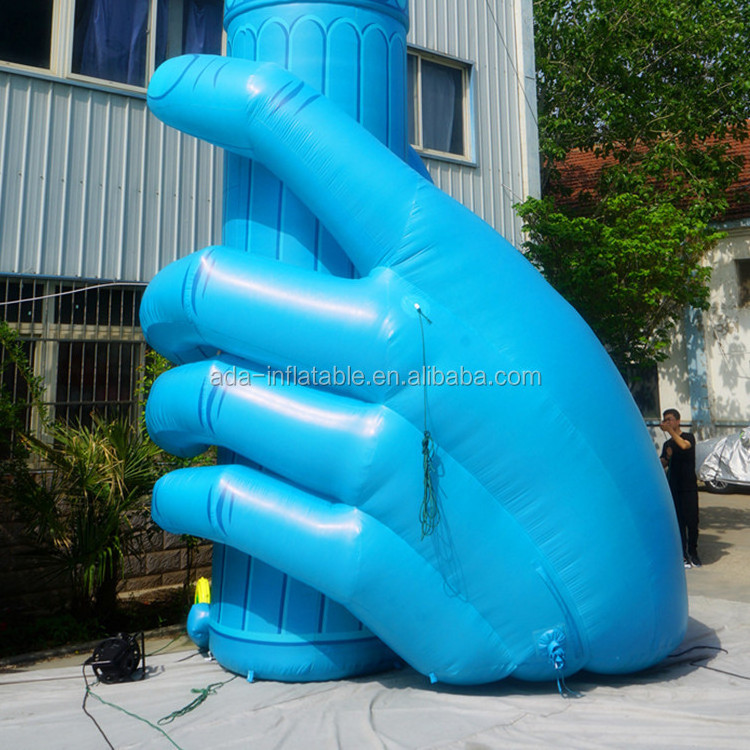 Size customized giant inflatable torch holding in hand for event ST1435