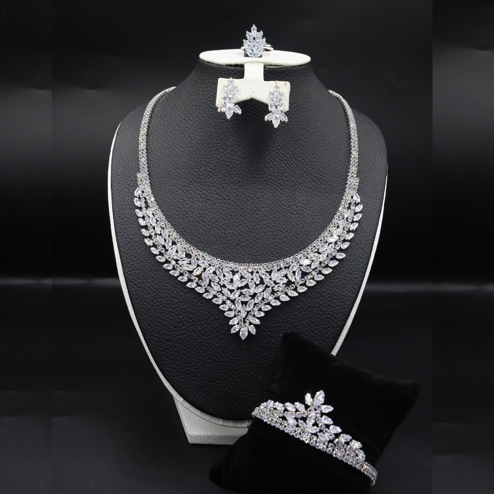 Dazzling Harmony: A Symphony of Cubic Zirconia, White Stones, and Silver Plating in Exquisite Jewelry Set