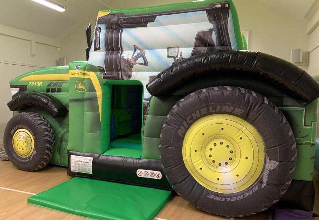 Wholesale Factory PVC Amusement Park Inflatable Tractor Bounce House With Slide