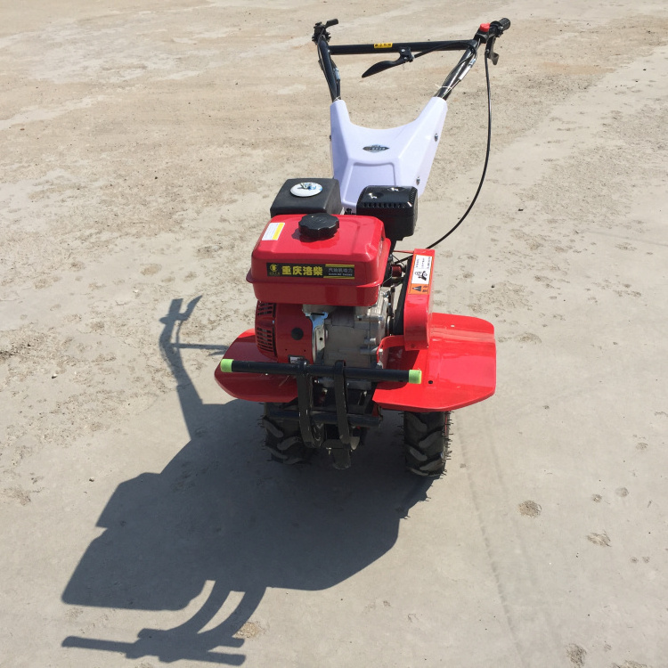 Small hand rotary cultivator four-drive micro cultivator mountain plow machine