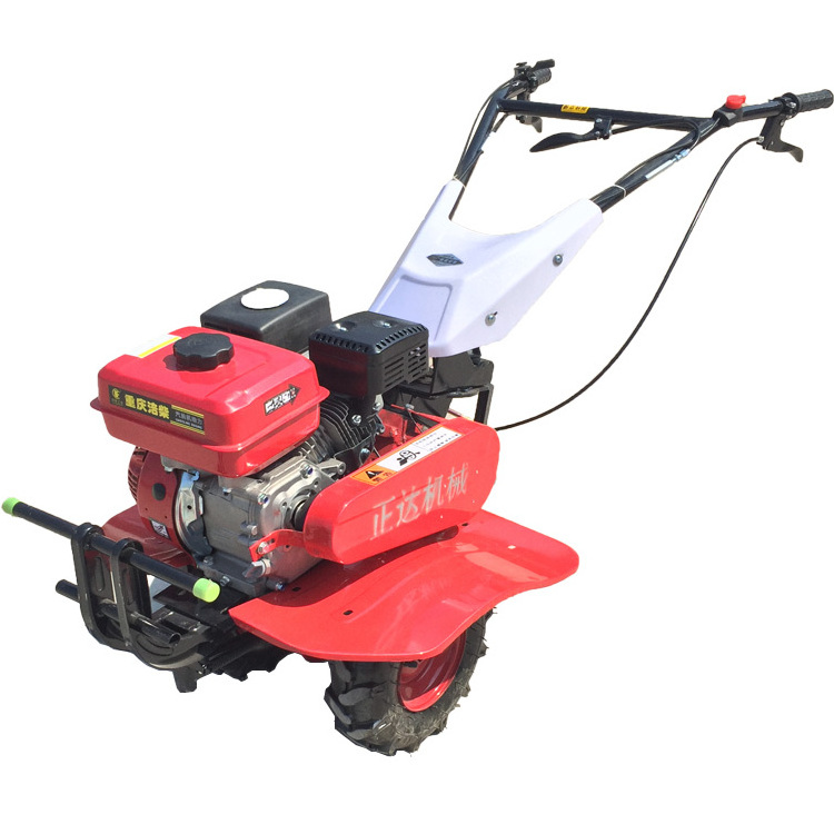 Small hand rotary cultivator four-drive micro cultivator mountain plow machine