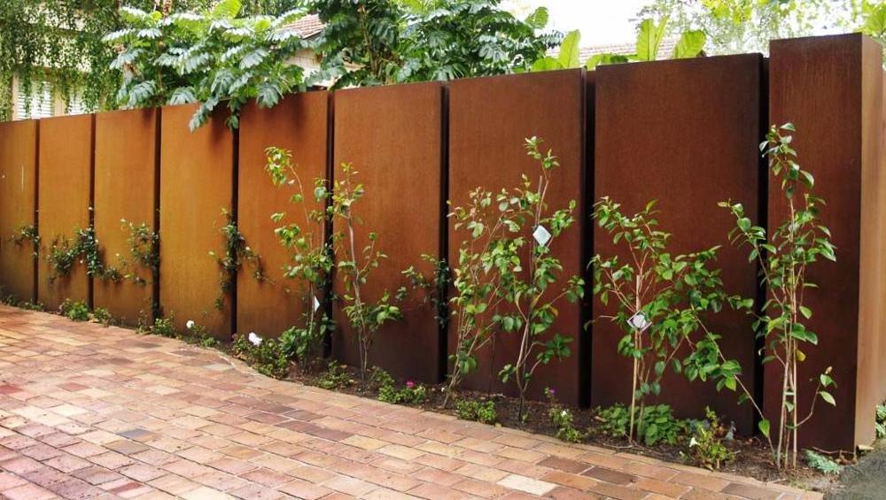 Decorative metal garden fence and gate