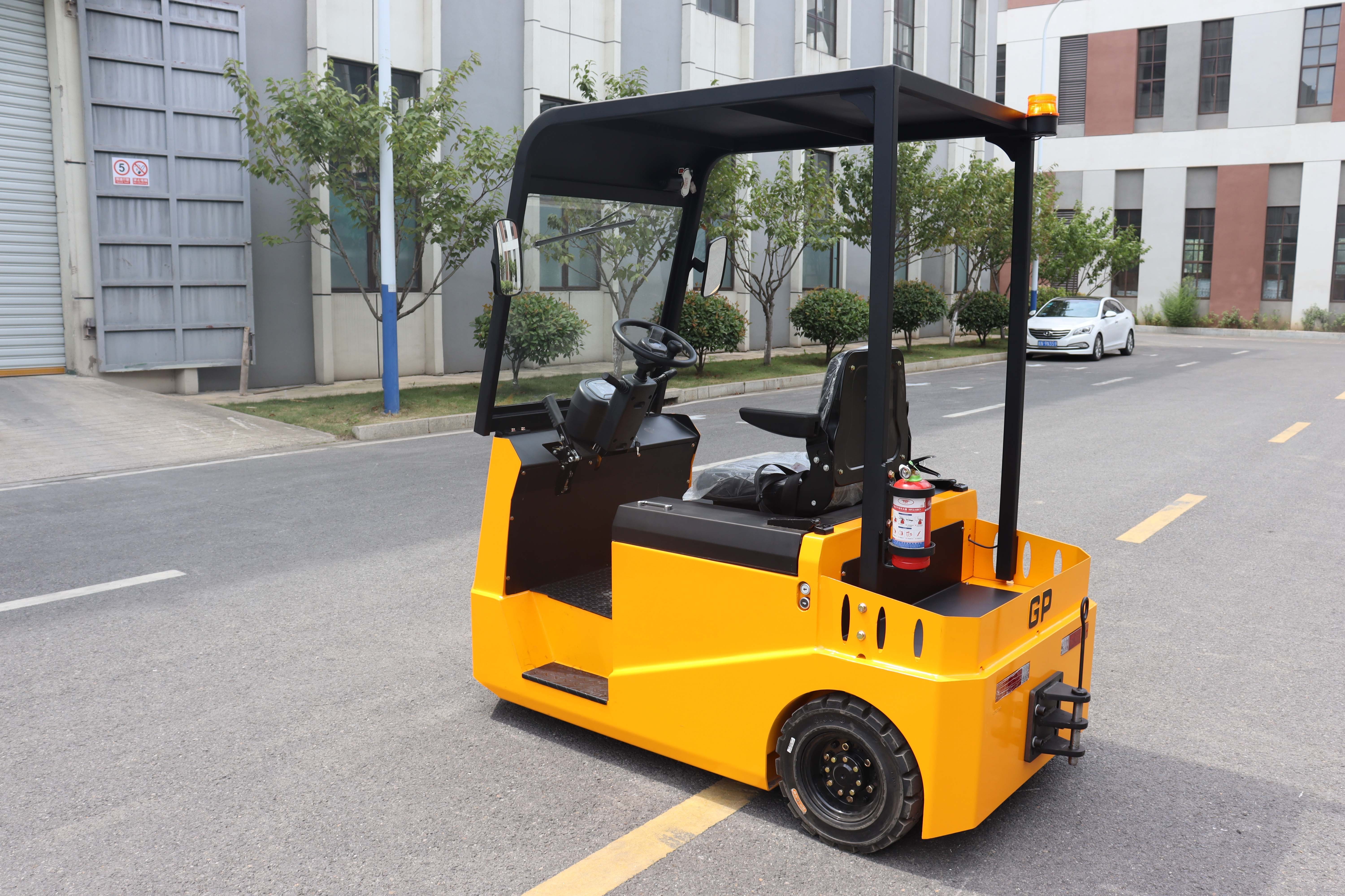 6000kgs 6 tons 12000lbs airport baggage battery seated tow electric truck in China