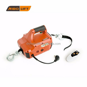 Powerful 500 lb Capacity electric winch with handheld crank and remote control