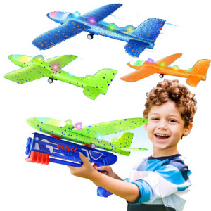 Outstoor Scratch Resistant Bubble Catapult Gun Airplane Toy With Throwing EVA Foam and Full Lights Plane Shooter Toy for kids