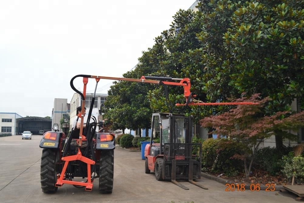 Tractor driven hydraulic hedge trimmer for cutting tree leaves