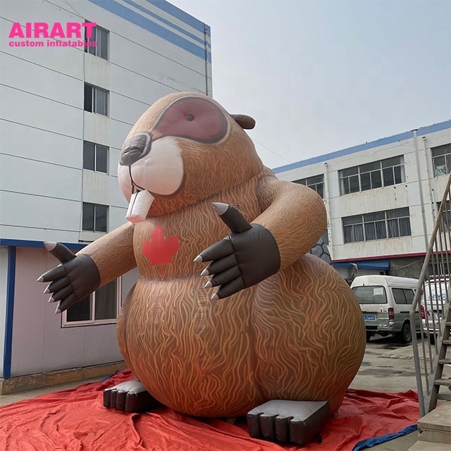 parade features giant inflatable animal decoration inflatable groundhogs