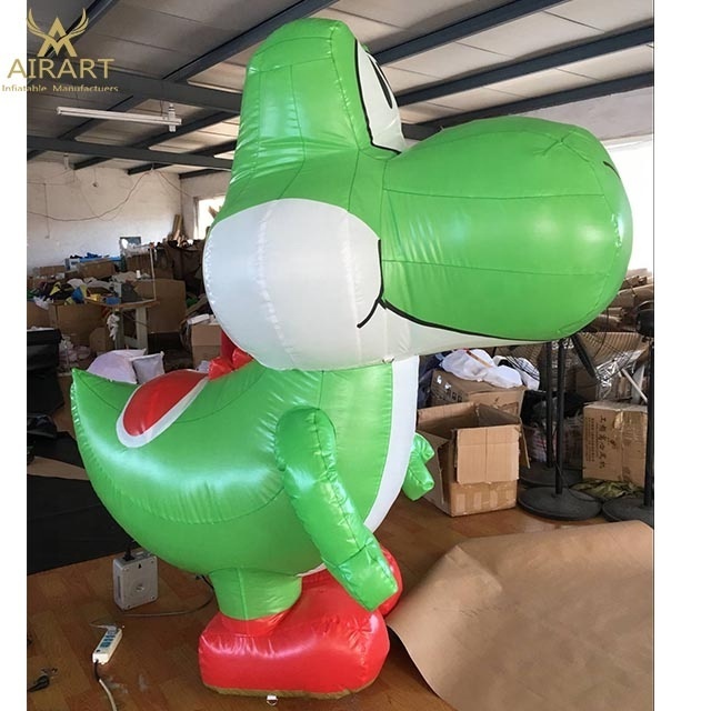 Green cartoon inflatable miniature dinosaur monster