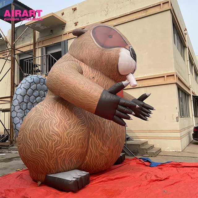 parade features giant inflatable animal decoration inflatable groundhogs