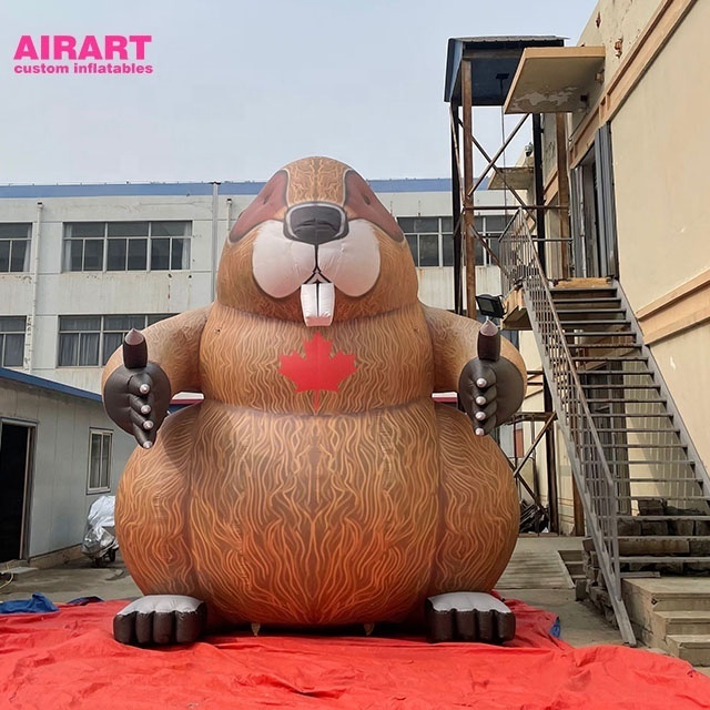 parade features giant inflatable animal decoration inflatable groundhogs