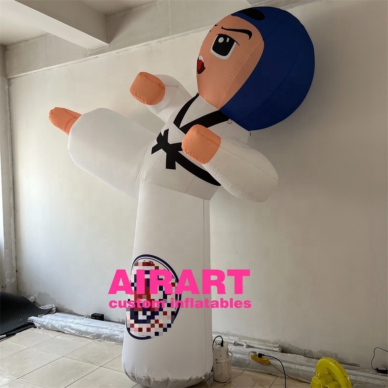 Taekwondo gymnasiums advertise inflatable cartoon characters to attract customers