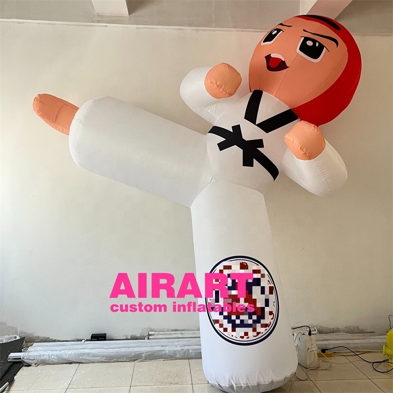 Taekwondo gymnasiums advertise inflatable cartoon characters to attract customers