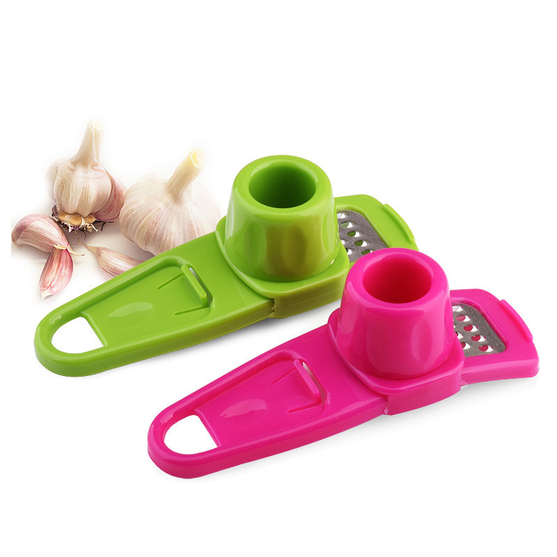 Hot Selling Kitchen Household 2023 Creative Protect Hand Safety Garlic Crusher Manual Plastic Garlic Grinder Garlic Press