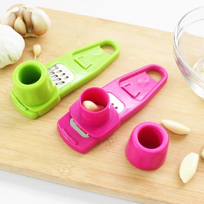 Hot Selling Kitchen Household 2023 Creative Protect Hand Safety Garlic Crusher Manual Plastic Garlic Grinder Garlic Press