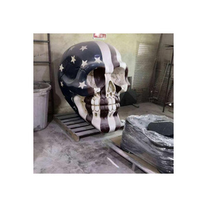 Creative custom life size outdoor Garden decoration large hand carved colored drawing Fiberglass skulls statue sculpture