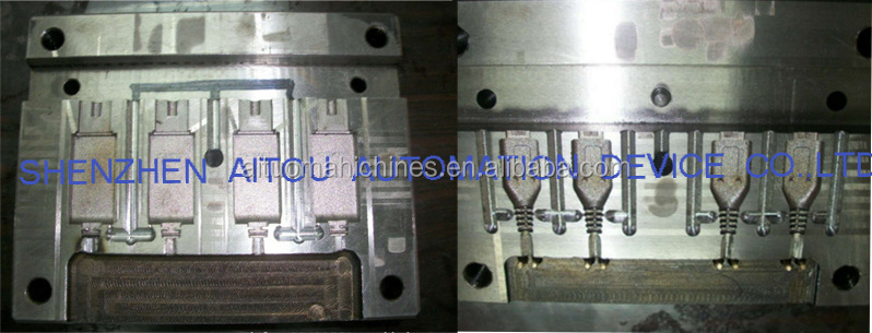 Small vertical injection machine for molding charger cable