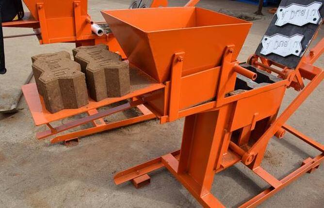 Low cost manual interlocking clay soil brick making machine  logo bricks earth block machine in small size clay machine