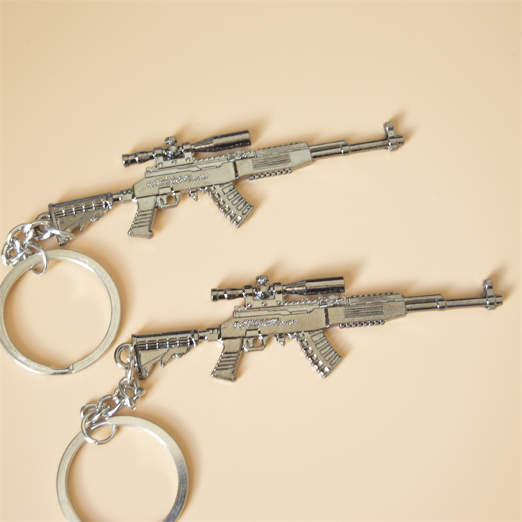 Promotional Gift Shooting Gun Game Metal Unique Bullet Self Defense Keychain