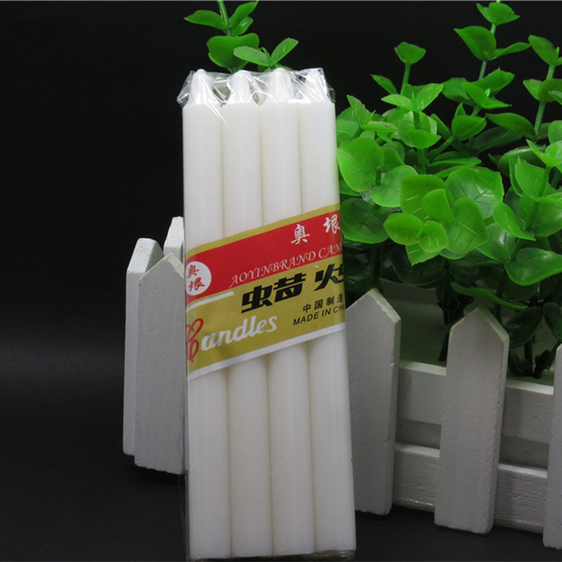 Religious white long church candle stick