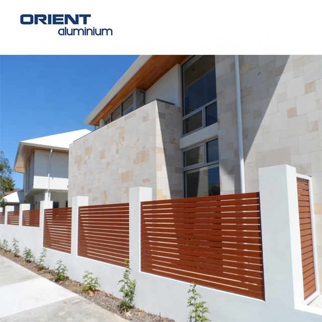 Aluminium slat fencing looks stylish and varnishing making it a low-maintenance gate or fence material.