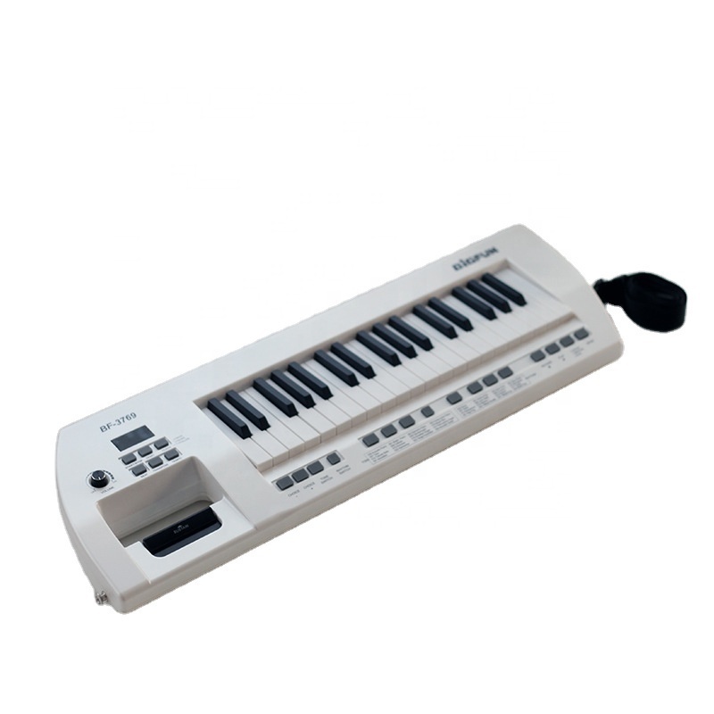 High quality hot-selling 37 key back-shoulder-carrying mini-sized guitar style sustain electronic organ keyboard piano