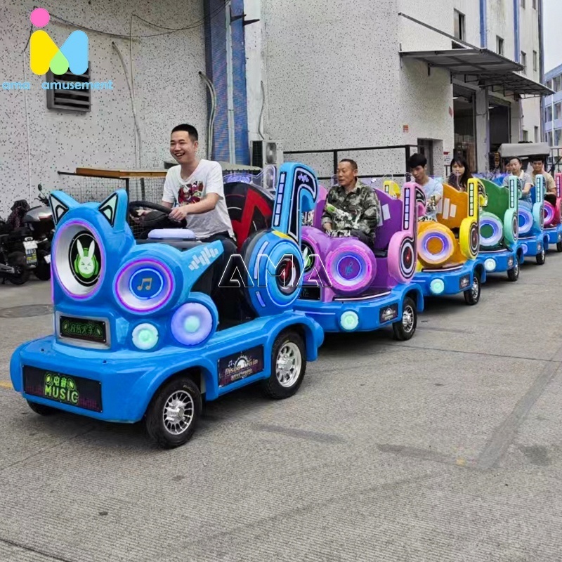 Guangzhou AMA Amusement Park Rides Christmas Mini Trackless Train Musical Train For Shopping Mall