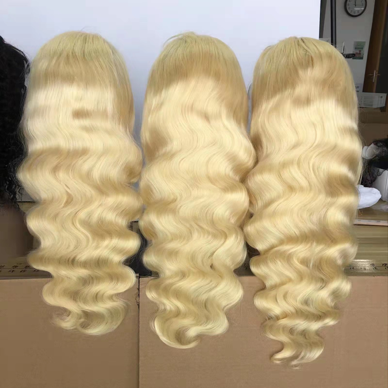 Amara best quality blond lace front body wave wig 12a grade virgin human hair south east asian raw hair in qingdao hair stock