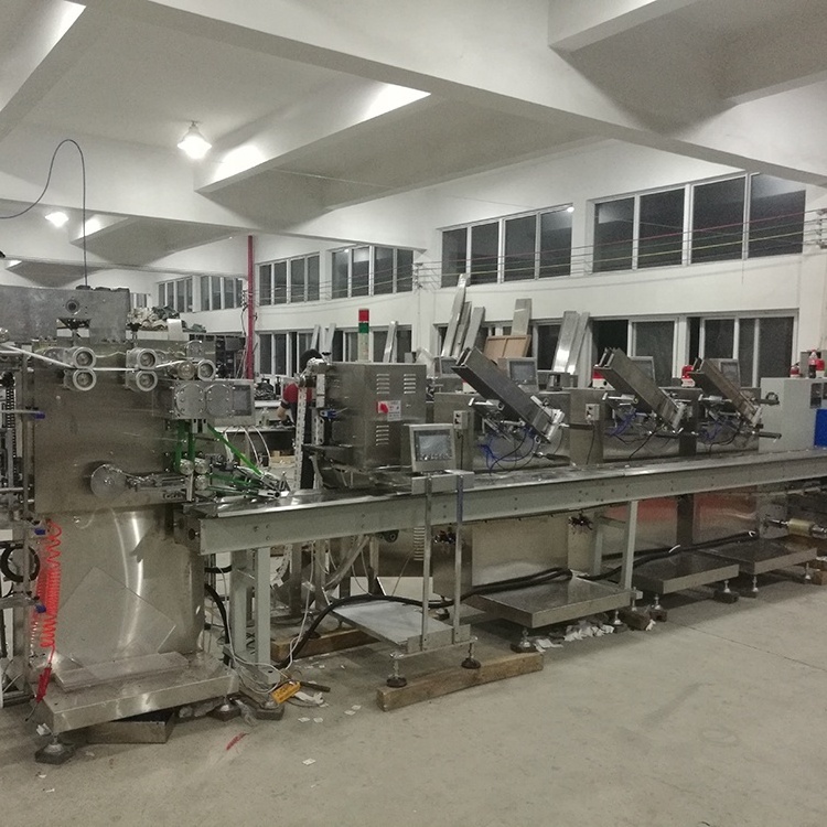 Automatic disposable plastic cutlery packing machine