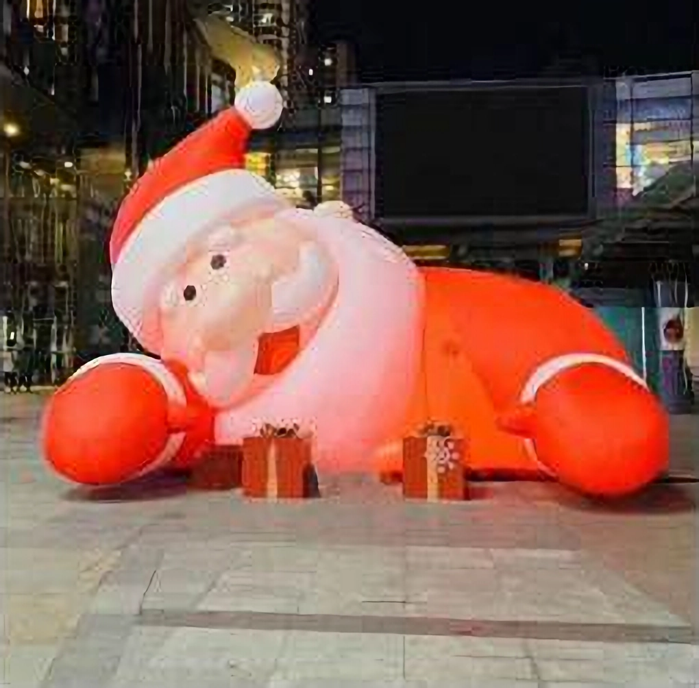 Giant LED light inflatable Santa lying on the ground for Christmas event decoration