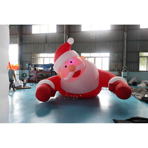 Giant LED light inflatable Santa lying on the ground for Christmas event decoration