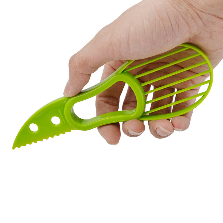 Kitchen accessory tool plastic food grade fruit peeler green avocado slicer for fruit