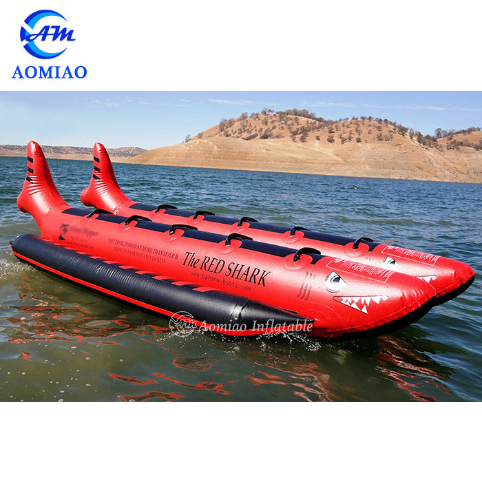 Newest design red and black inflatable flying fish banana boat, inflatable shark water taxi passenger boat