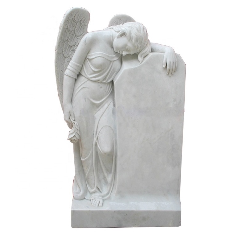 White marble gravestone with sculpture sad angel with head down