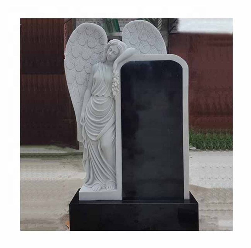 Rectangular black marble tombstone with granite standning angel statue