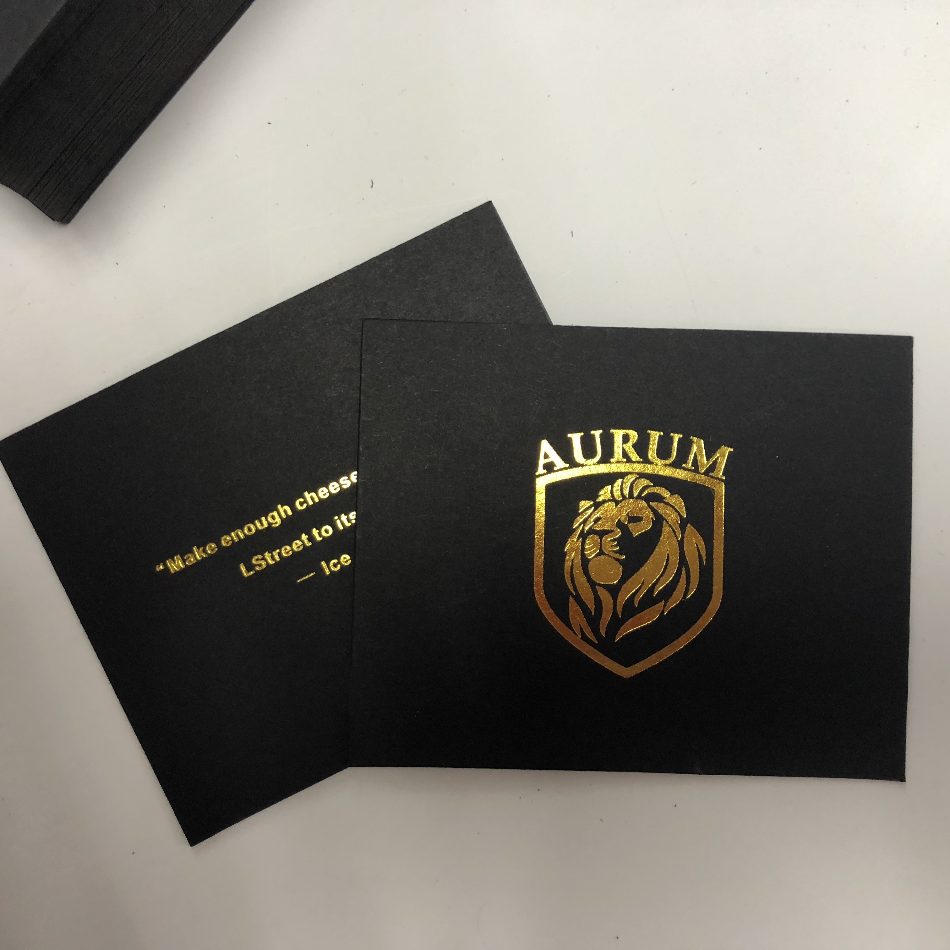 Black cardboard gold foil stamp embossed letterpress printing paper business card