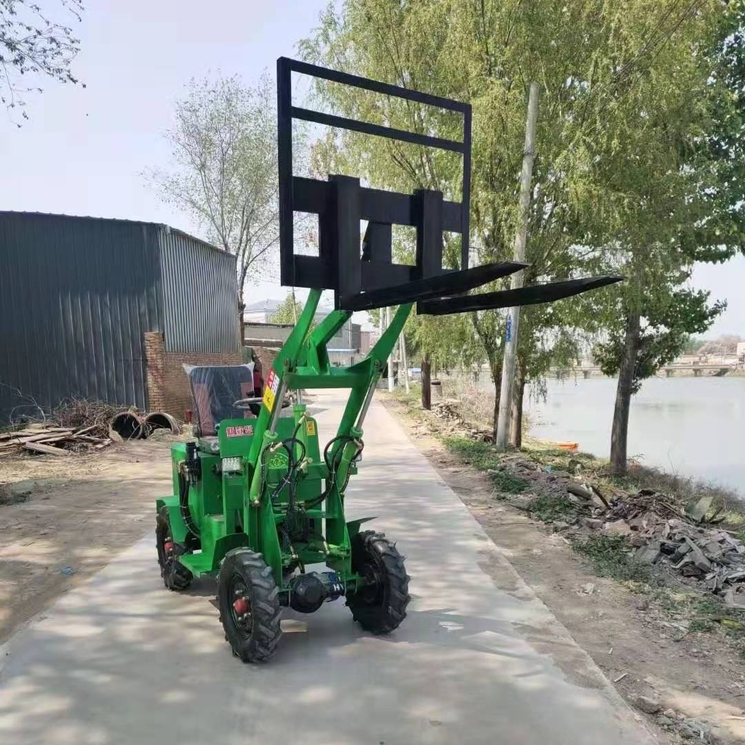 Small mini towable backhoe tractor wheel loader shovel with forklift pallet fork for garden farm orchard use