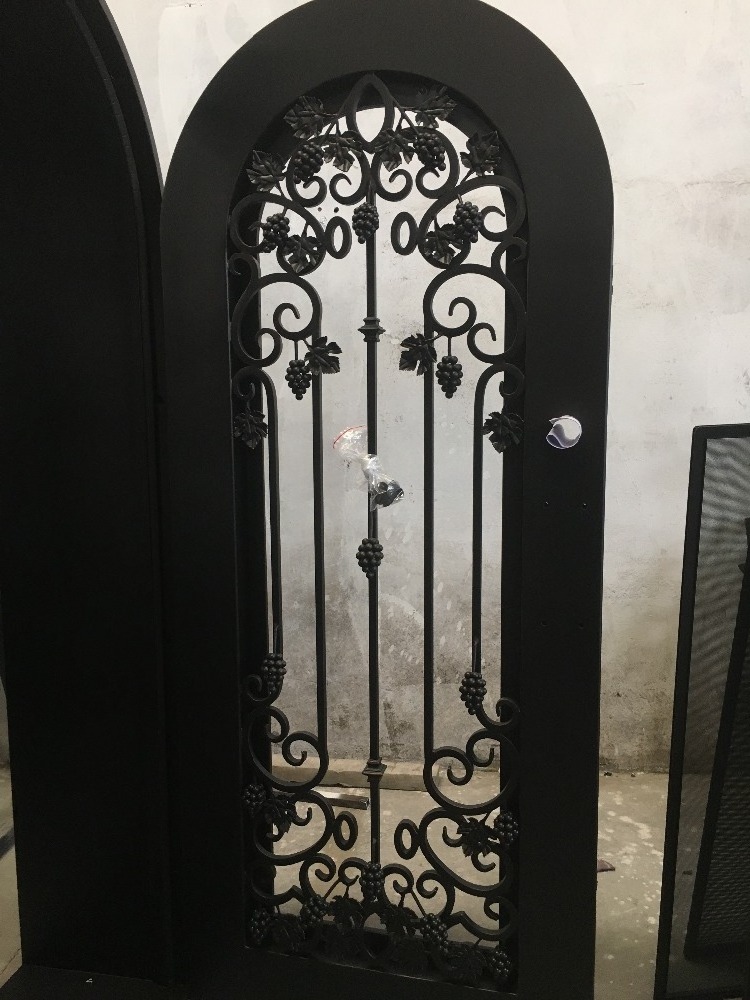 Decorative wrought iron single wine cellar entry doors