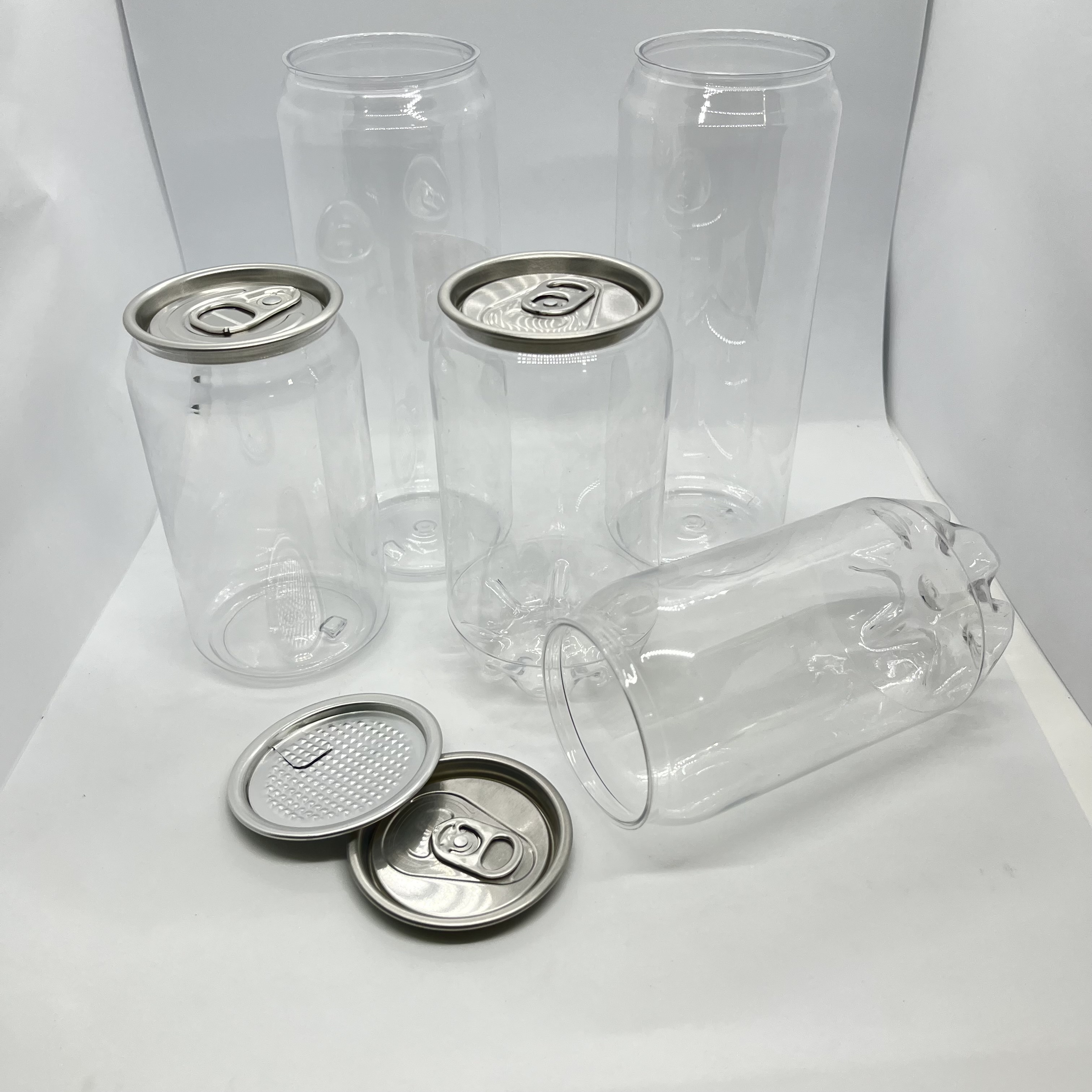 Wholesale 500 Ml  16 Oz Transparent  Empty Cold Drinks Plastic Soda Can/ Clear  PET Soda Can / Bulk Soda Cans