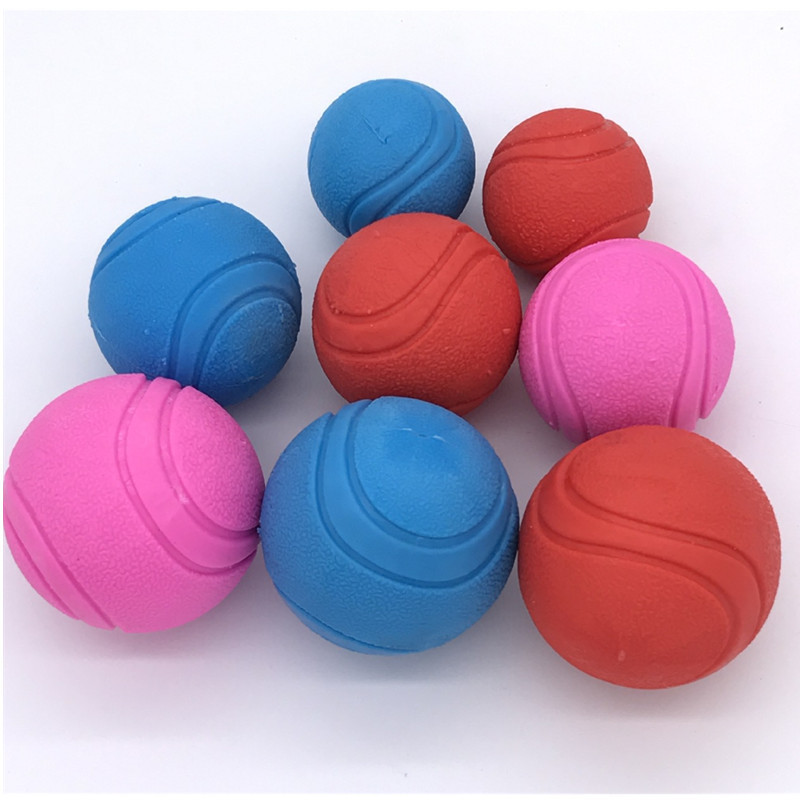 Training dogs to chew a ball pet bite-resistant ball solid rubber elastic ball through a rope pet toy with a rope