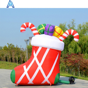 Factory hot Sale giant red Inflatable Christmas sock stockings with candy cane for Christmas boot air balloon model