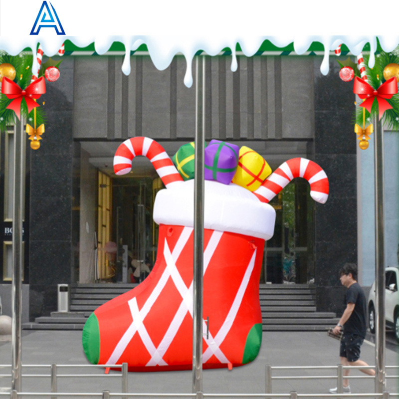 Factory hot Sale giant red Inflatable Christmas sock stockings with candy cane for Christmas boot air balloon model