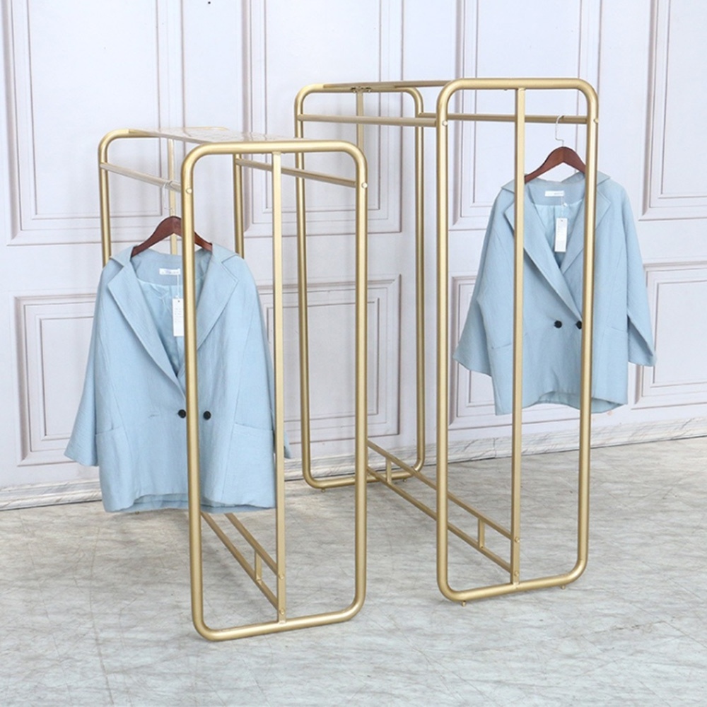 Hot Selling Novel Hollow Carved Design Retail Store Metal Clothing Display Gold Rack Clothing Commercial Garment Rack