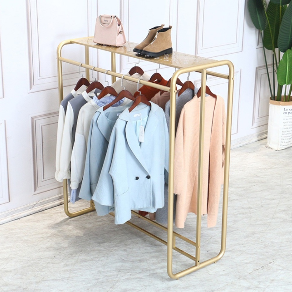 Hot Selling Novel Hollow Carved Design Retail Store Metal Clothing Display Gold Rack Clothing Commercial Garment Rack