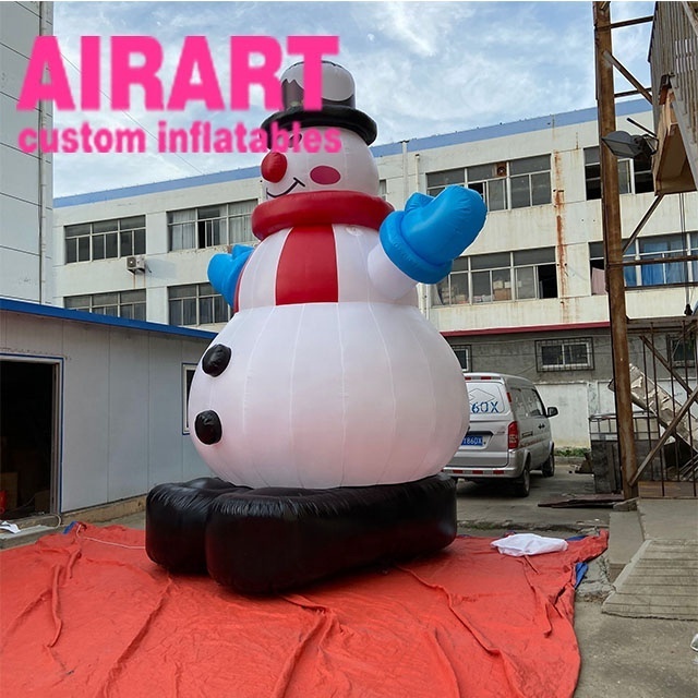 Big advertising inflatable winter Christmas snowman with broom balloon