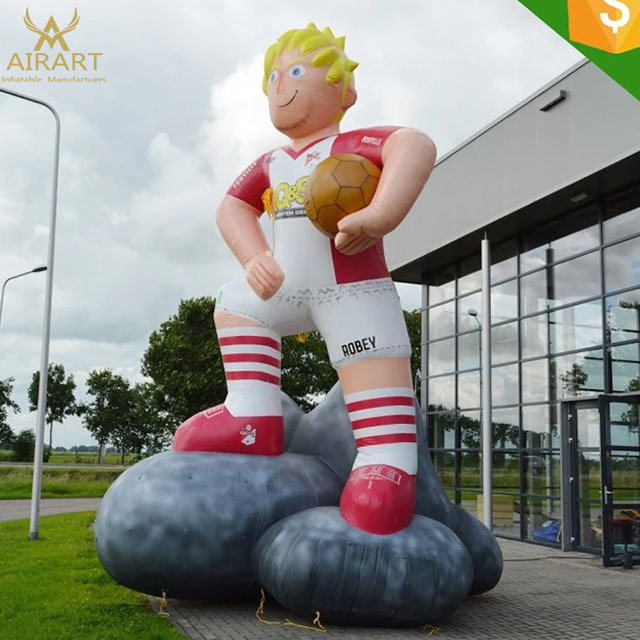 Giant inflatable football/soccer player cartoon mascot