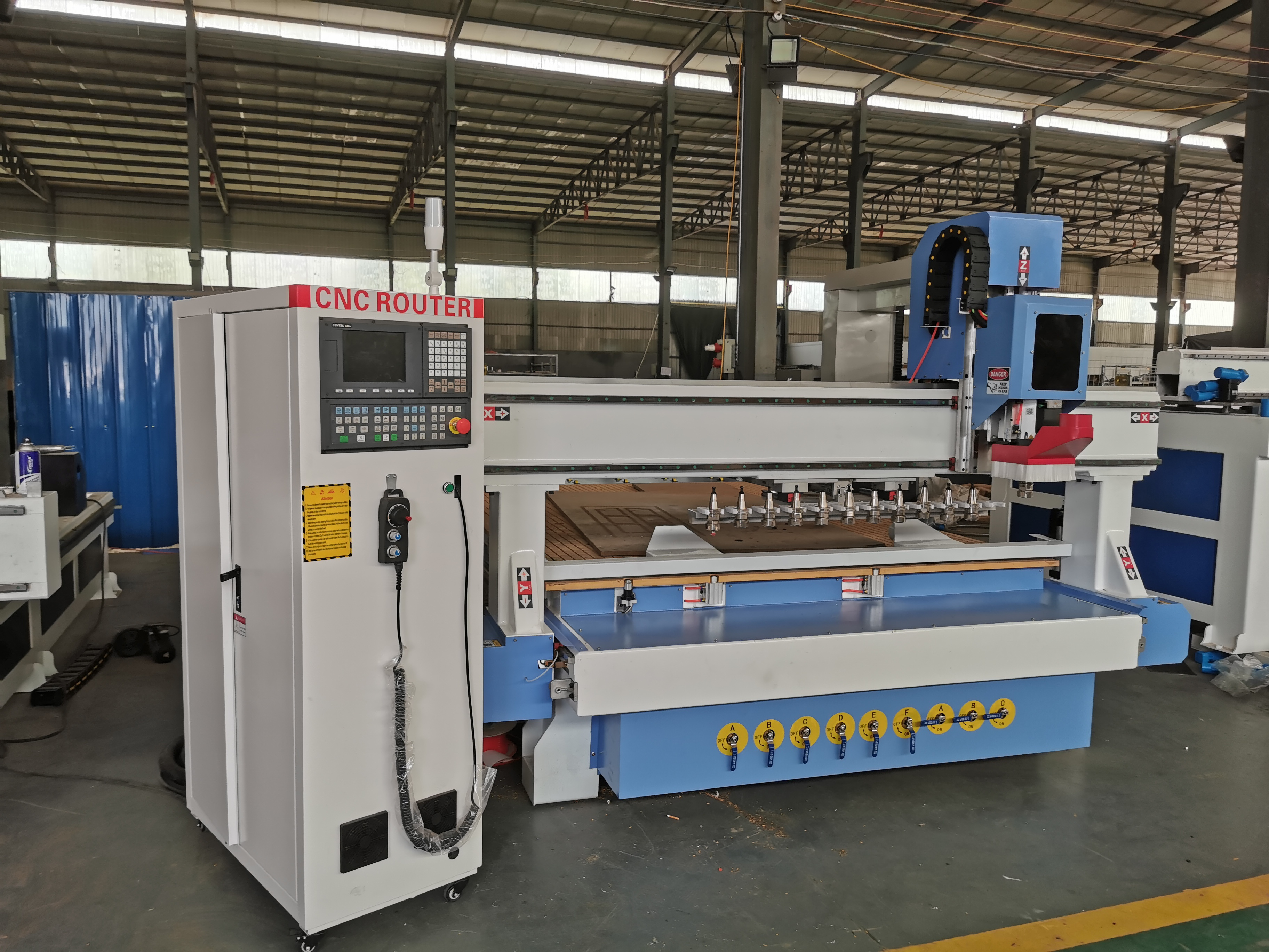 China 6090 1212 1325 1530 2030 2040 3 Axis 4 Axis 5 Axis Atc Woodworking Rotary 3D Cnc Router Wood Mold Engraving Machine Price