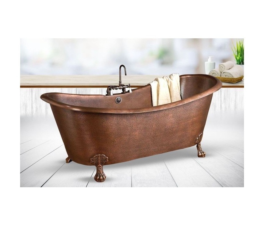 copper bathtub in shiny metal